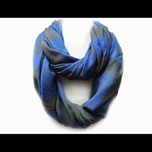 A blue and grey chevron pattern infinity scarf.